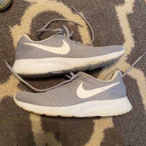 Nike Tennis shoes. Slightly worn.